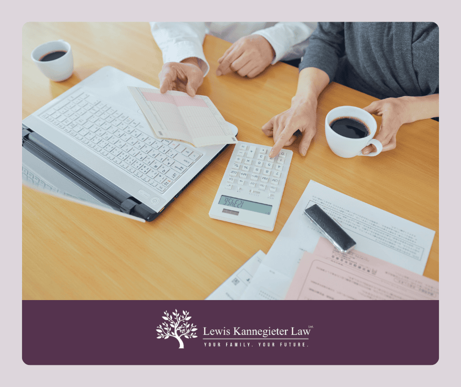 Tax account Desk with computer, calculator, papers, and coffee