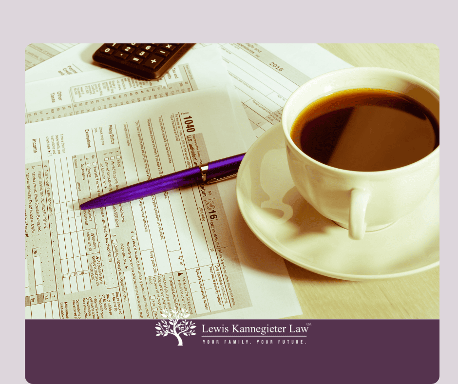 Coffee cup and tax paperwork