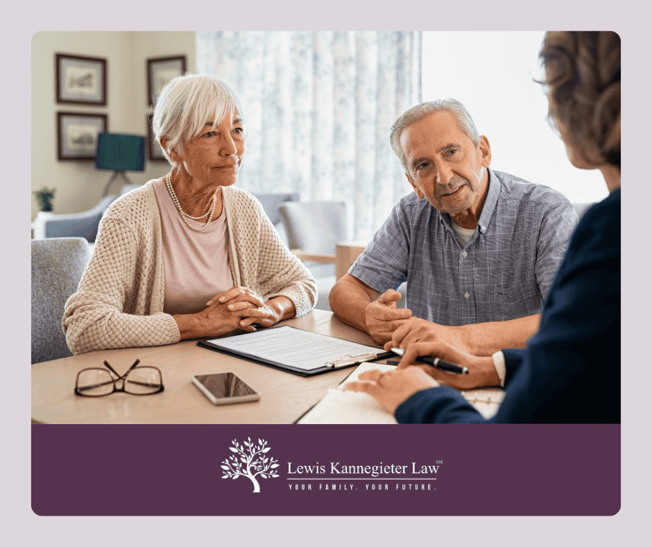 Elderly couple consulting with lawyer